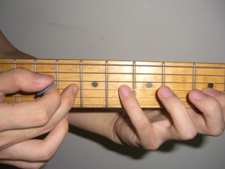 Guitar Tapping with middle fingers